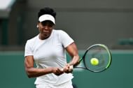 Venus Williams hits a backhand at the 2021 Wimbledon Championships